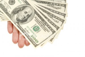 ist2 2197231 hand with banknote 300x200 Health Insurance Companies Process 1 in 5 Claims Wrong