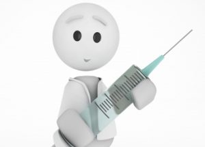 a cute 3d doctor with a syringe (3d isolated happyman series)